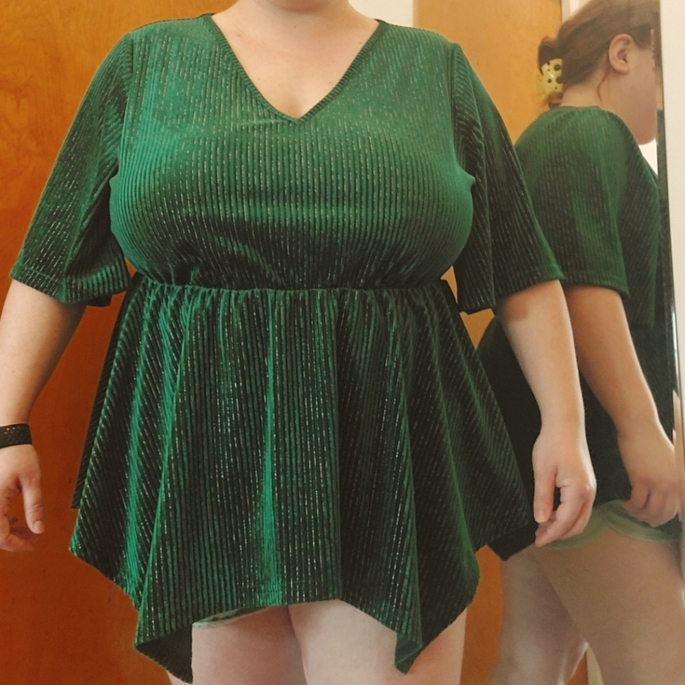 Green puplum top